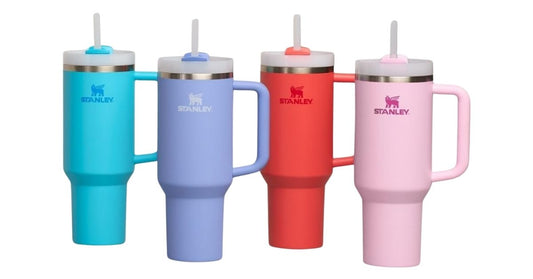 Stanley Quencher H2.0 FlowState 30 oz tumblers in pastel colors with handles and straws