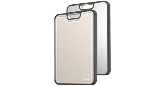 Dual-sided titanium cutting board with non-slip edges and built-in handle for durable kitchen use